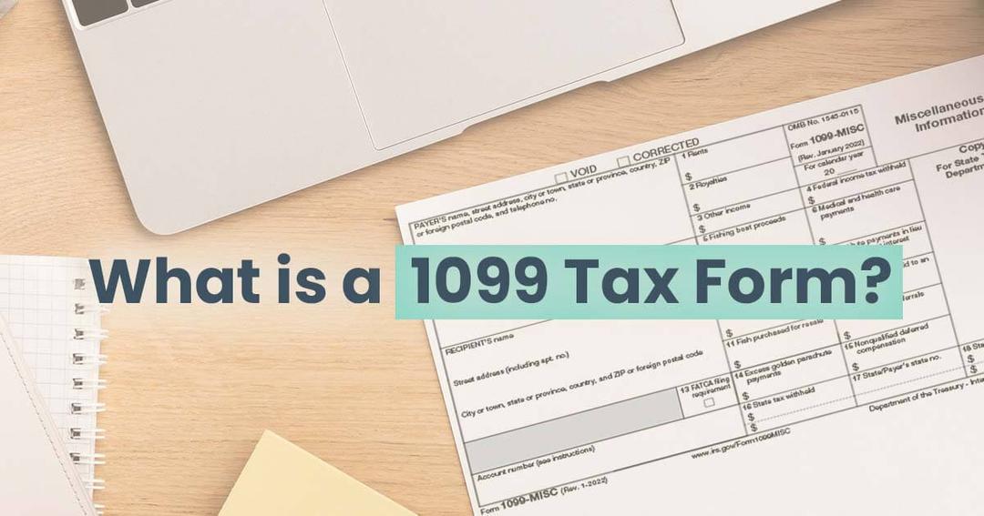 A workspace with a computer, 1099 tax forms, and a notebook, featuring the question "what is a 1099 tax form?" in bold text.